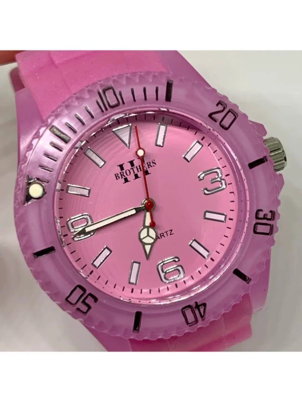 Brothers Quartz analog watch 43mm rotating bezel ,pink silicone band running